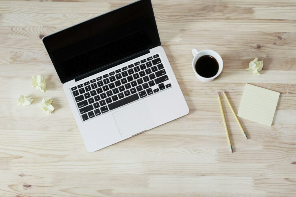 Laptop with a coffee mug connected to a wireless network